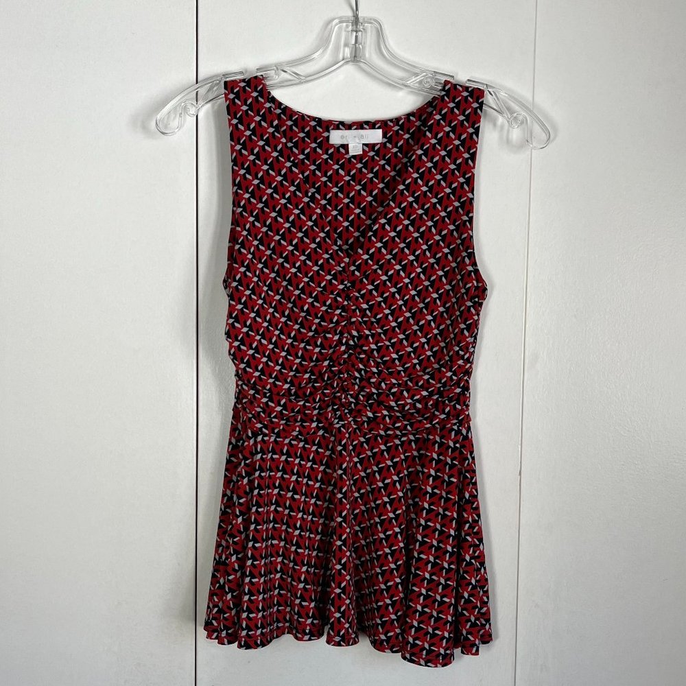 Patterned sleeveless peplum blouse by Eri + Ali